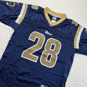 Youth Kids Medium football Jersey. Rams. Faulk. Reebok. Blue  Gold  White.